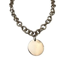 Authentic Tiffany & Co. Round Return to Tiffany’s design. Really good condition.